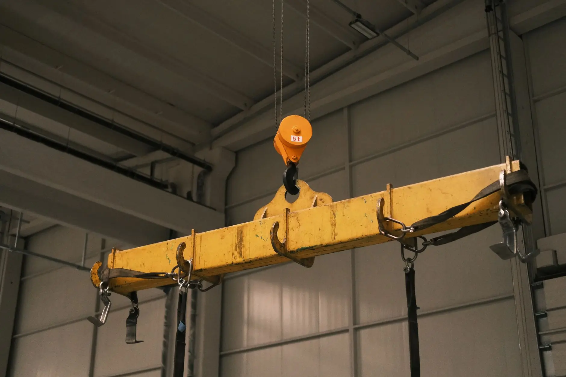 Industrial hoist lifting a load in a workshop